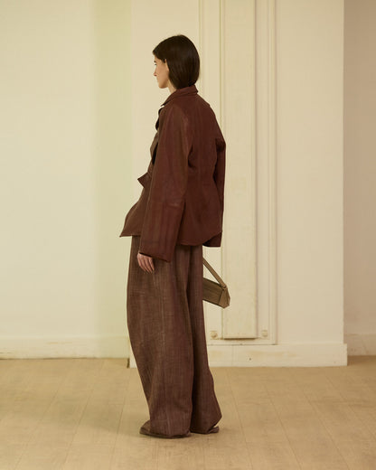 Brown leather blazer with armholes in the front