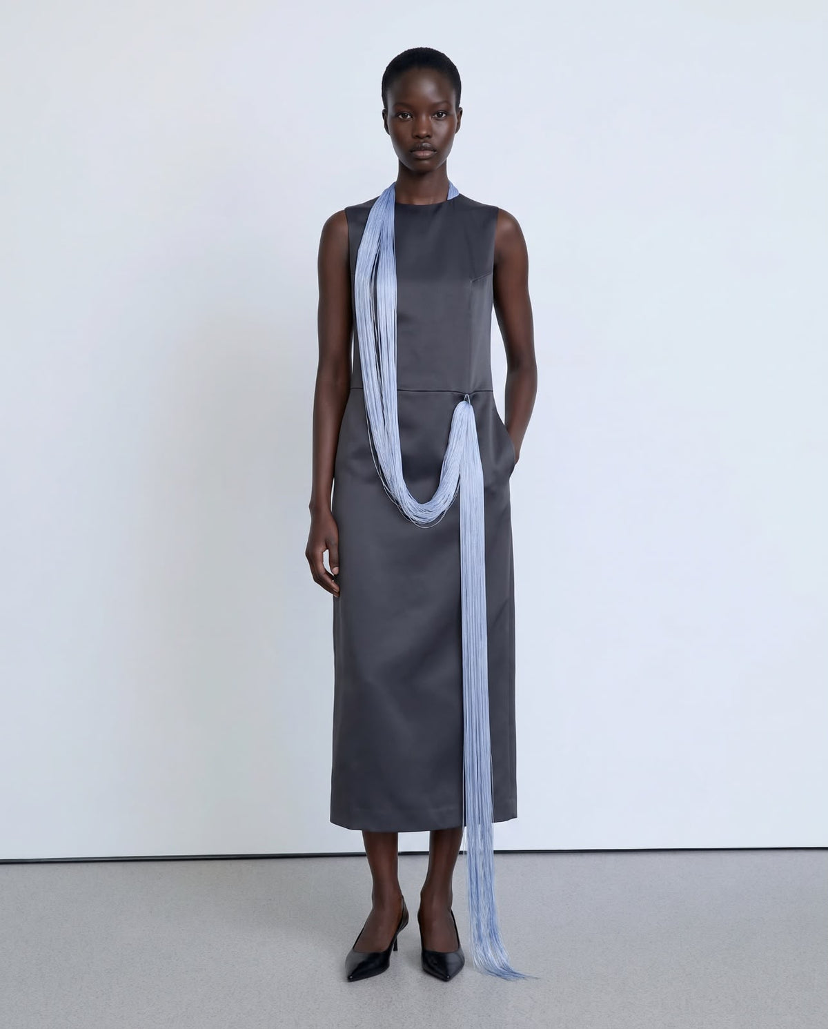 Straight-cut grey dress with long blue fringes